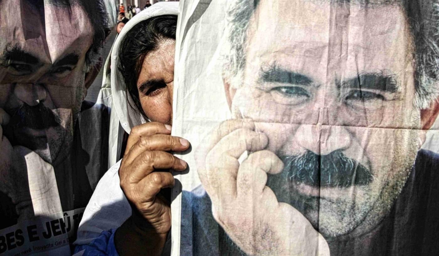 A Kurdish woman holds a poster of Abdullah Ocalan at a protest in Silopi near the Turkish-Iraq border I November 2007 (AFP).jpg A Kurdish woman holds a poster of Abdullah Ocalan at a protest in Silopi near the Turkish-Iraq border I November 2007 (AFP).jpg