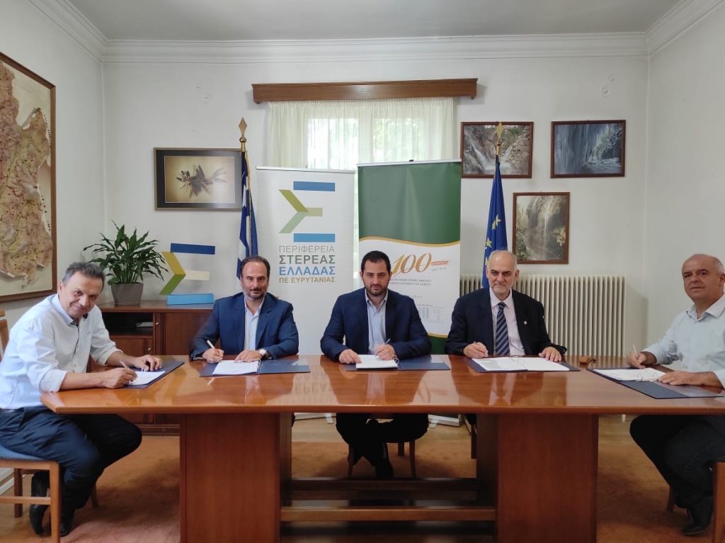 Karpenisi AUA signing.jpeg Karpenisi AUA signing.jpeg